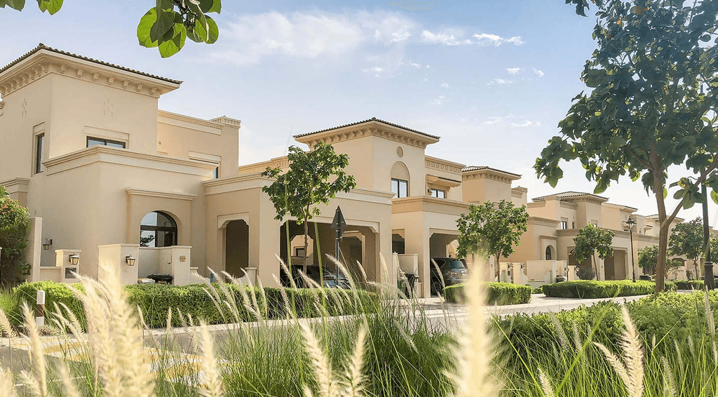 The villa at The Palms in Dubai, showcasing modern architecture amidst lush greenery in Arabian Ranches 2.