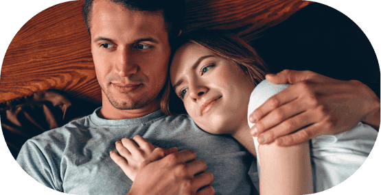 A young couple embracing each other