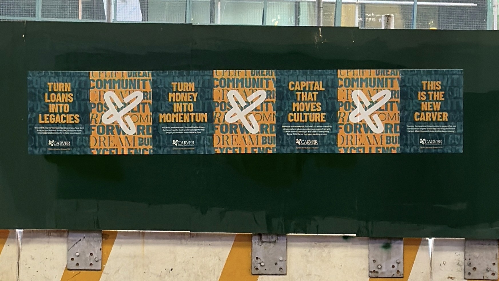 Carver Bank wheatpaste campaign on a New York construction wall