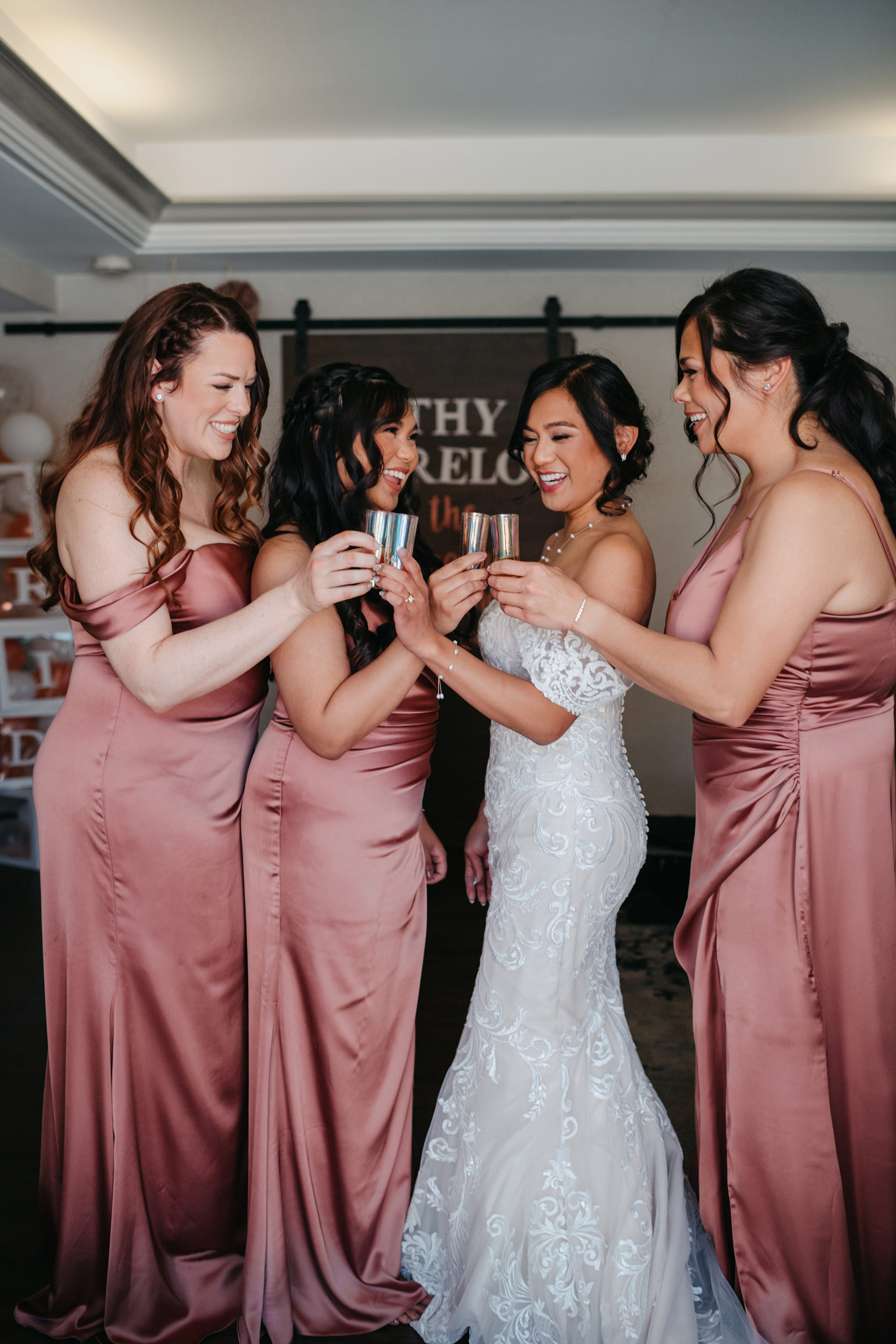 Flat lay wedding details with bouquet, rings, and sparkling bridal heels