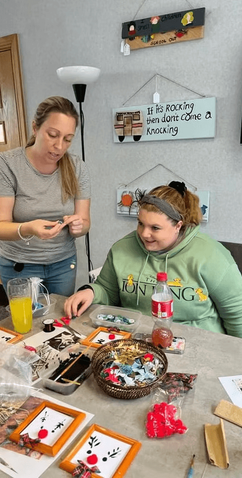 Group of men standing with Sufboard