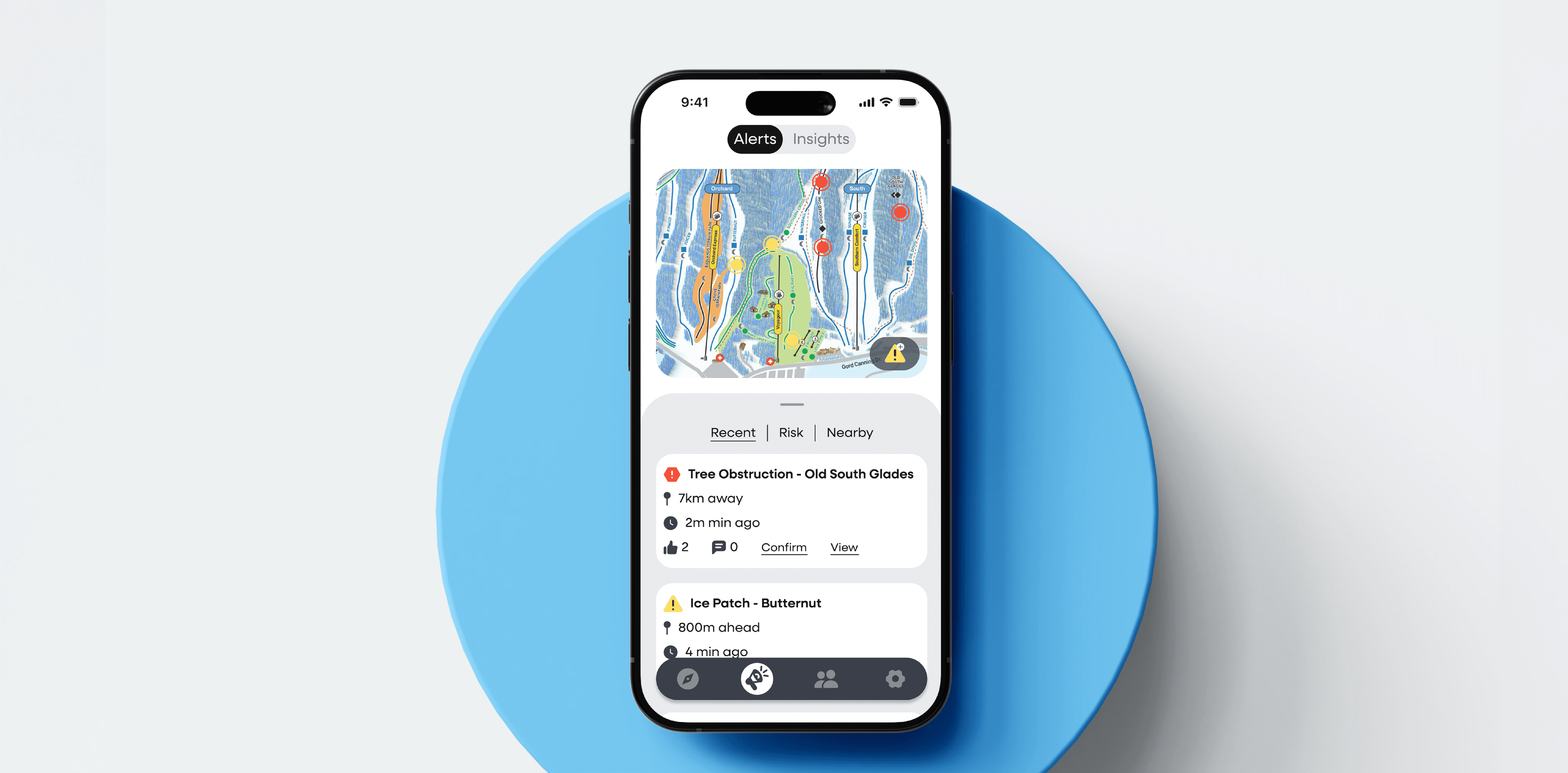 Floating smartphone mockup displaying a mountain‑safety app welcome screen with snowy ski‑lift background and sign‑up/sign‑in buttons.