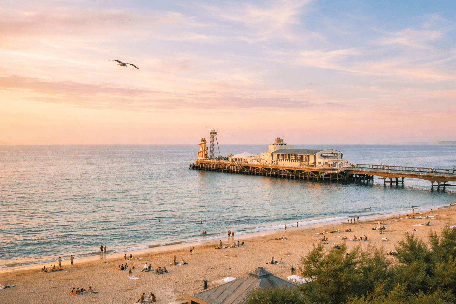 a pier with people on it and a large body of water in the background