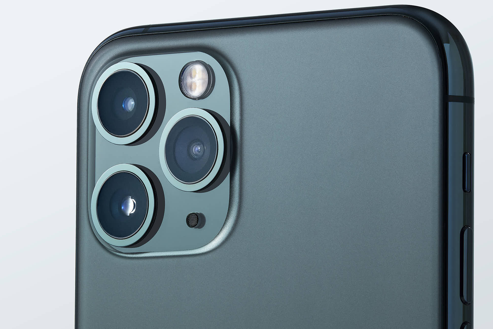 Close-up of a smartphone triple-camera lens setup in a sleek gray design.