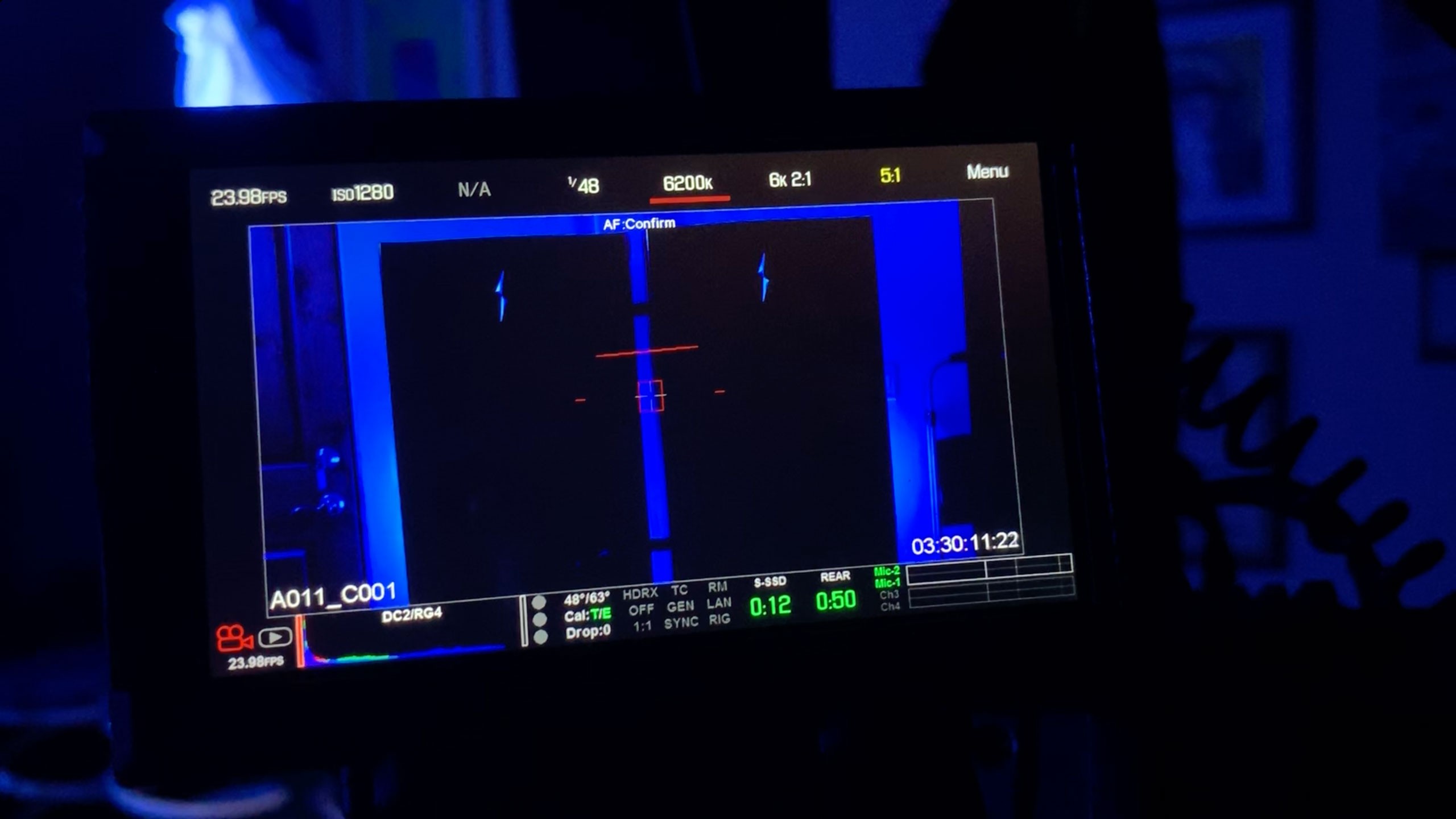 Behind-the-scenes shot of the monitor view of a camera shot