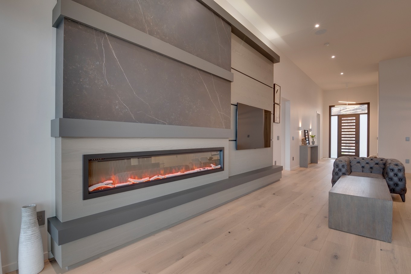 Contemporary living room with modern fireplace and wall panels
