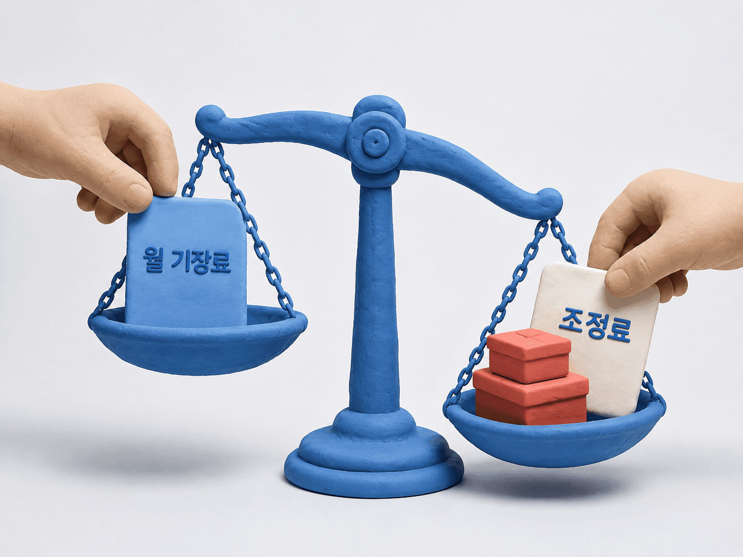 양팔저울에 올려진 종이 두 장과 한쪽에 더해진 상자
