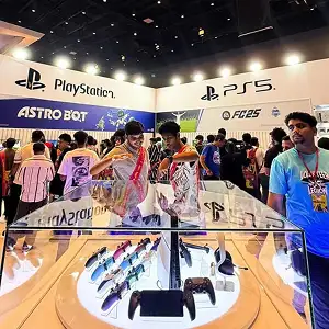 PlayStation 5 gaming convention booth featuring Astro Bot and FC25 controller showcase.