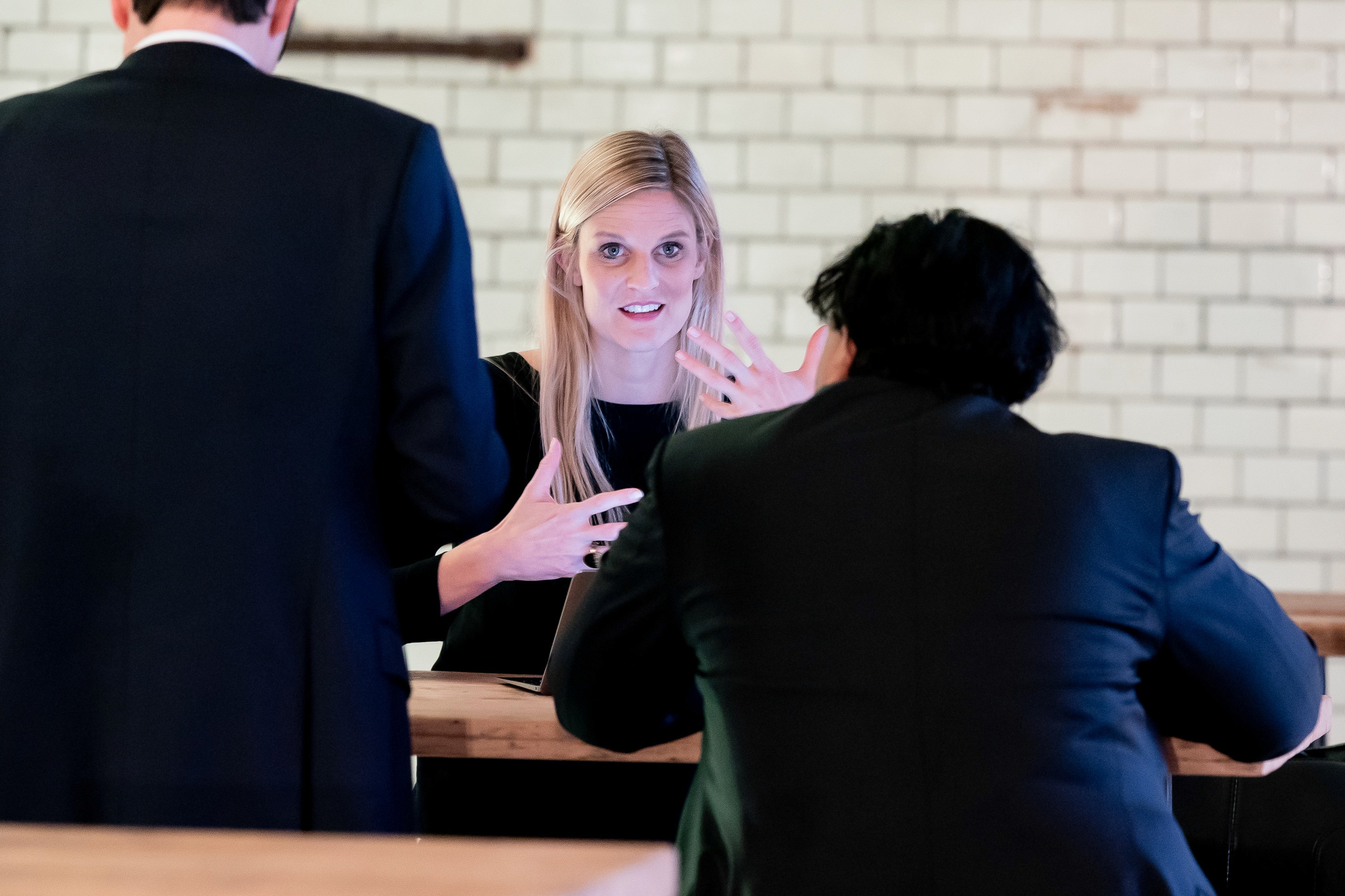 A woman smiling sitting in the office
