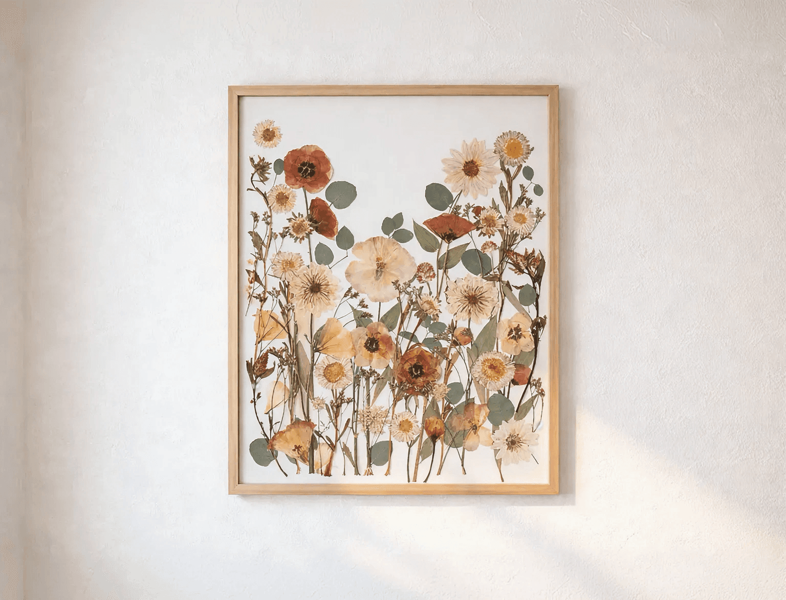 gepresste blumen in einem bilderrahmen