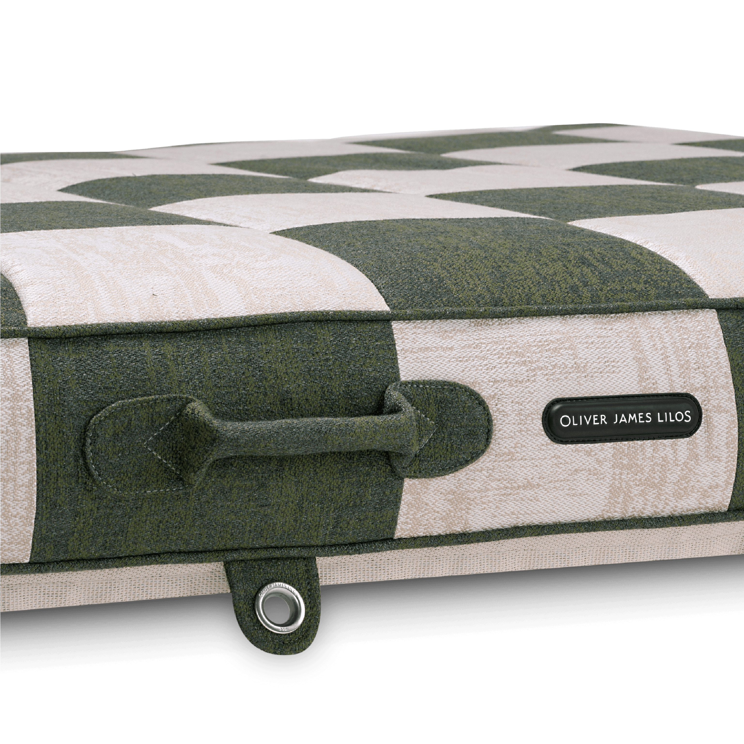 Close-up of pool float showing patchwork jacquard handle, colour-matched stitching, and stainless eyelet