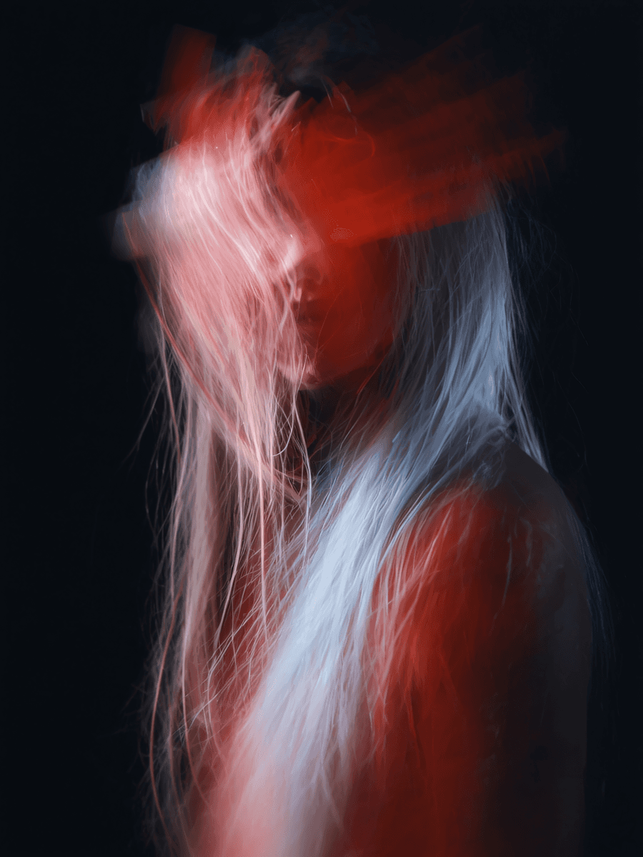Abstract portrait with dynamic red and white lighting effects, featuring motion blur and a dark background for a surreal, ethereal vibe.