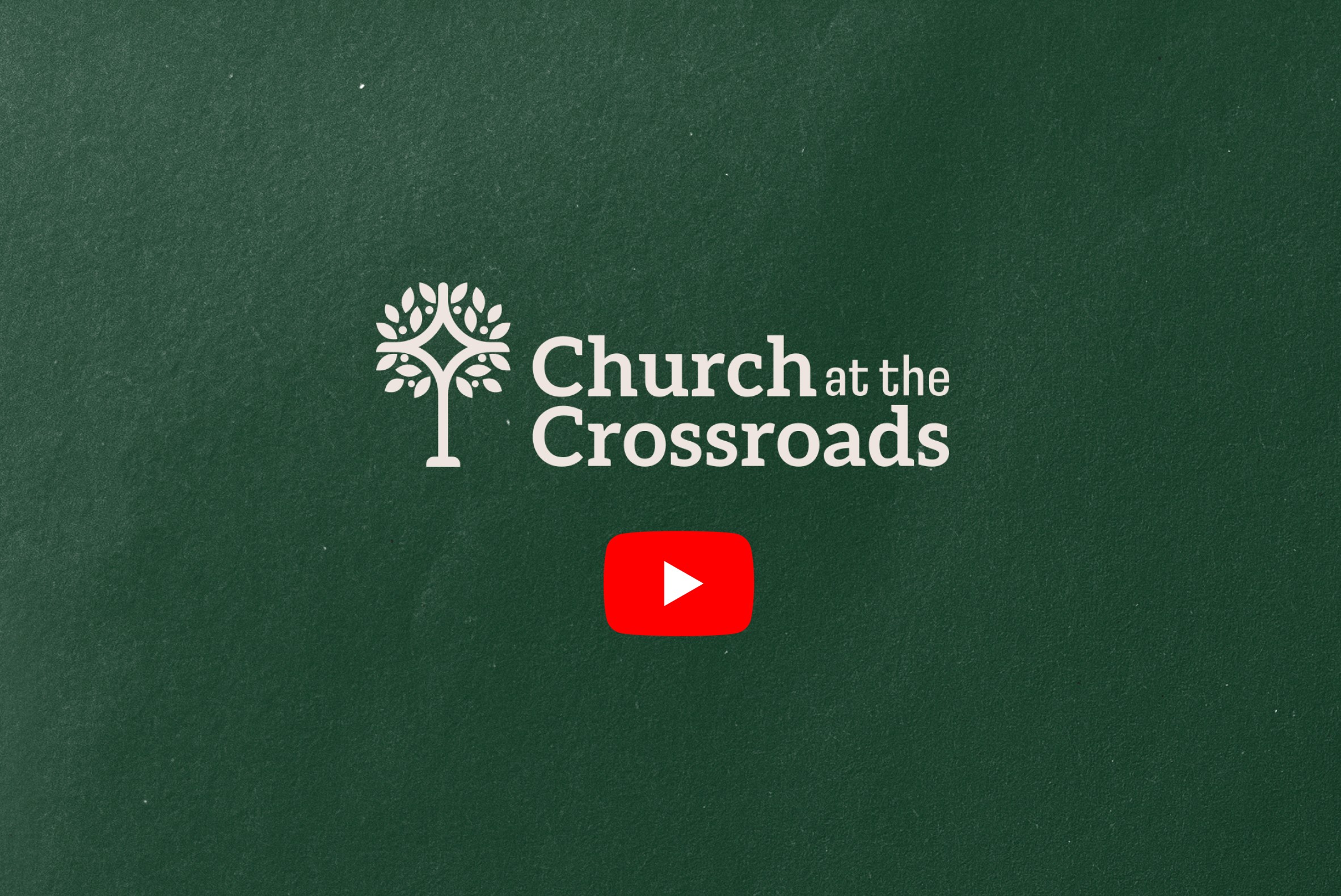 a couple of people standing next to a motorcycle