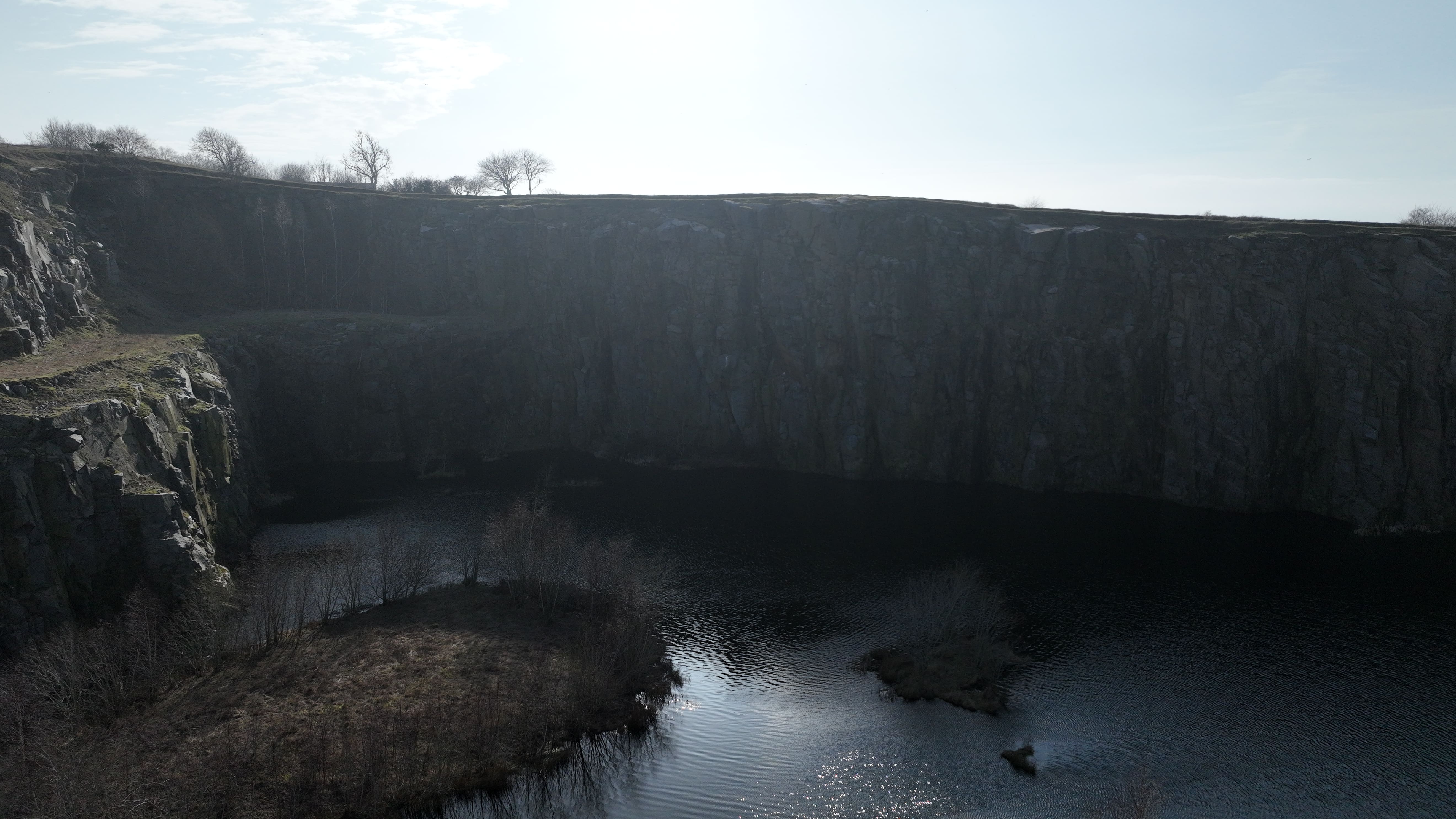 a blue square object on a wooden surface