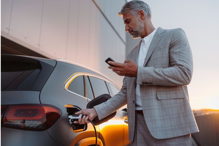 Man charging EV