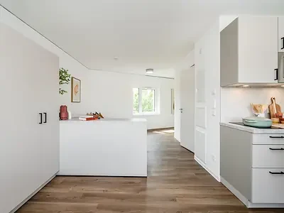 Kitchen and living area inside modern student accommodation in Berlin