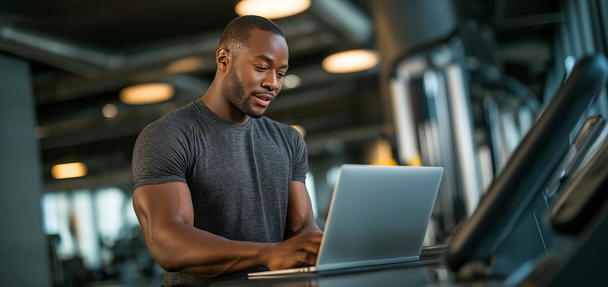 Gym manager on computer
