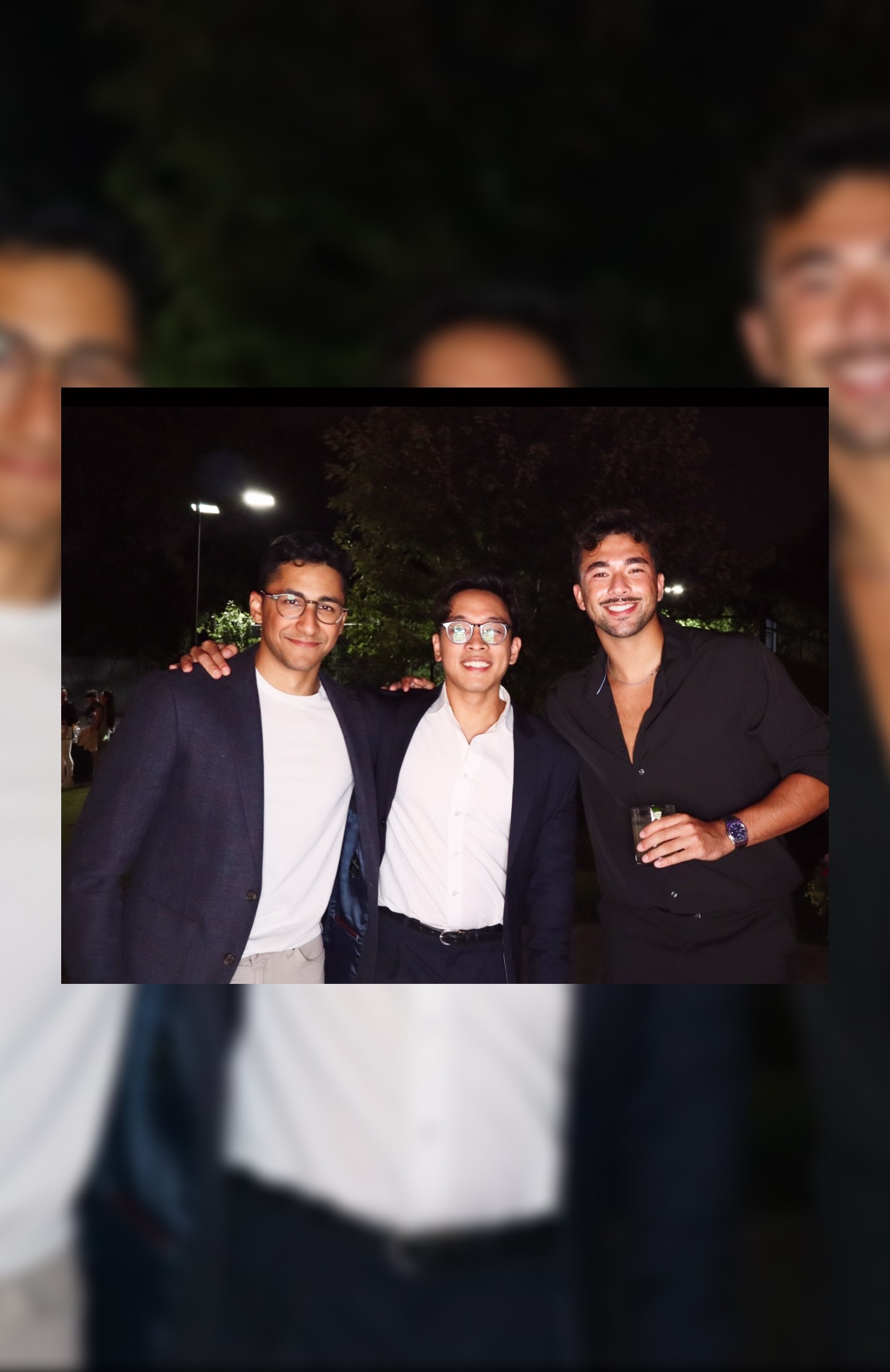 a man that is standing up with headphones on