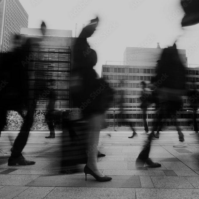 Black and white image of office security people walking through London
