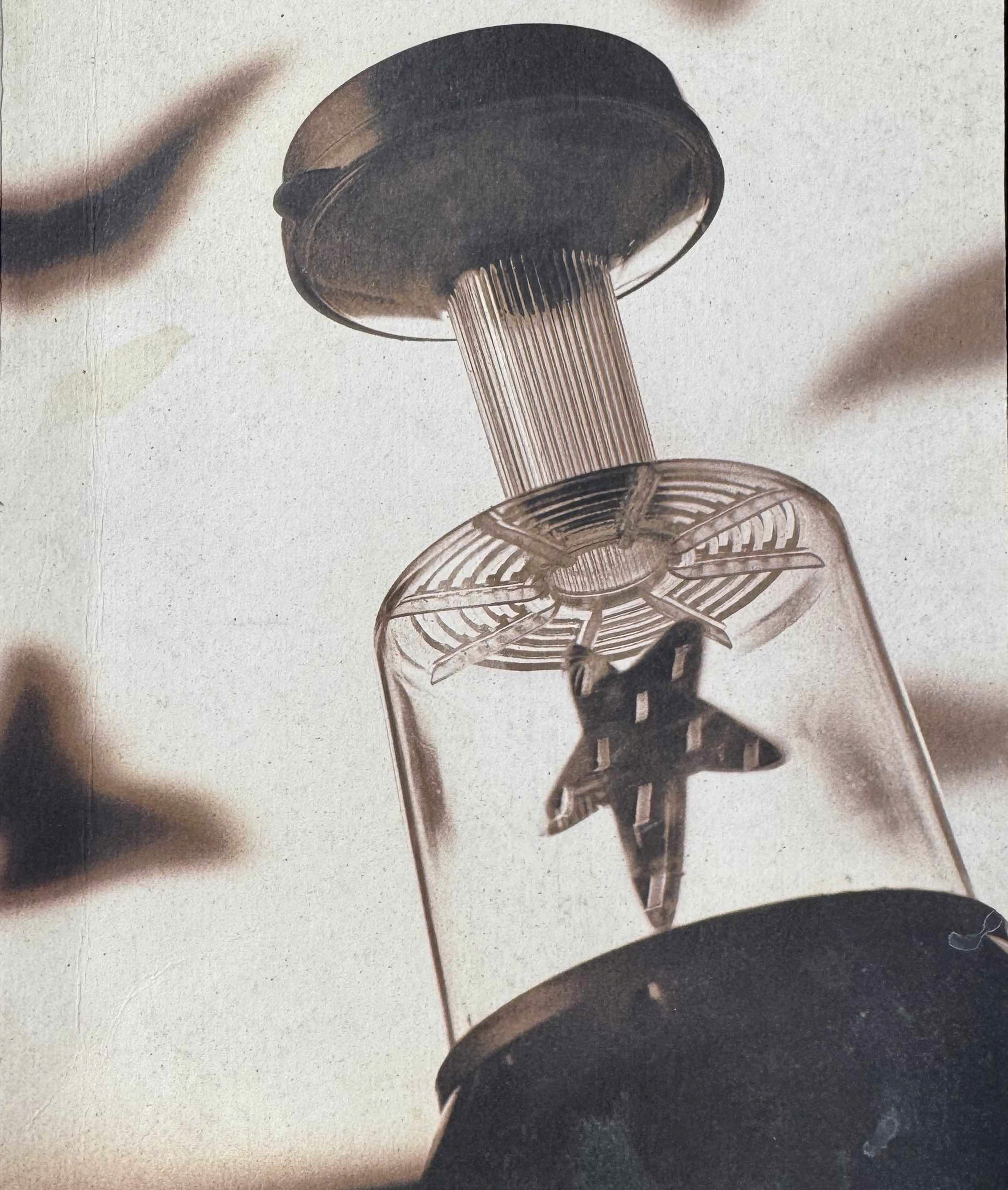 a close up of a black and brown abstract painting