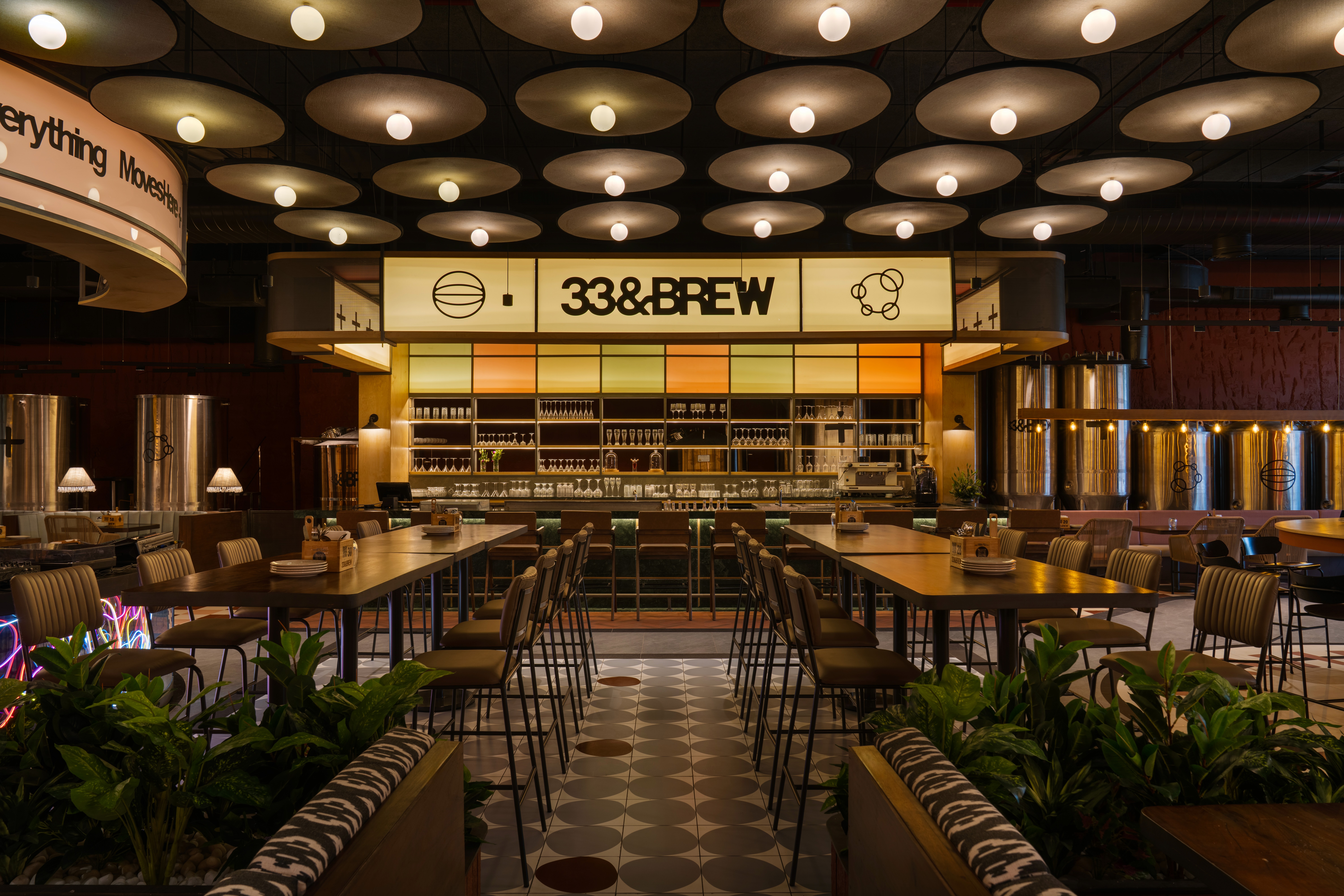 Streetside billboard with flyposters of the Batch.Works brand and illustrations