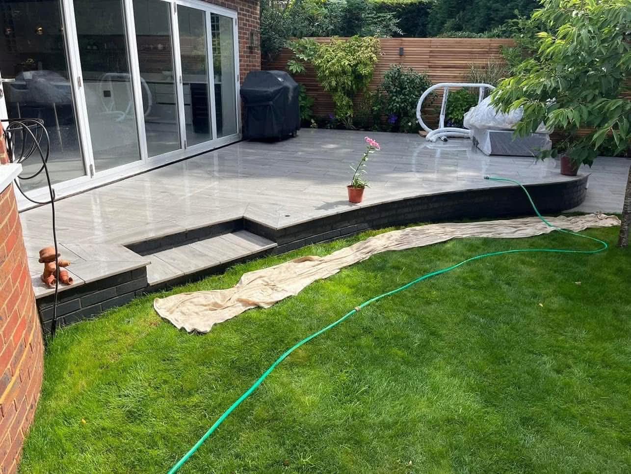 Modern backyard garden with warm lighting