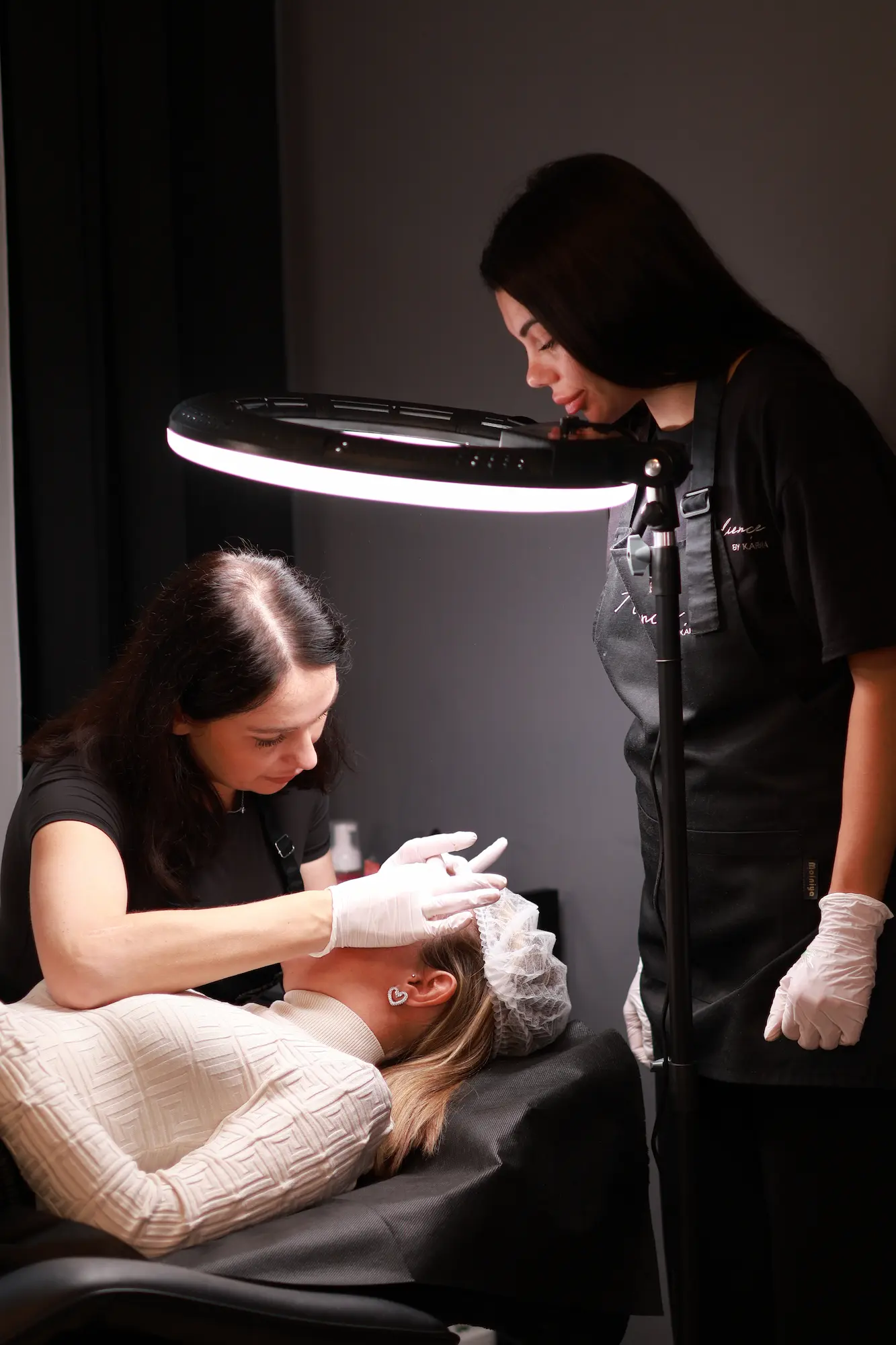 Client receiving treatment in professional studio setting