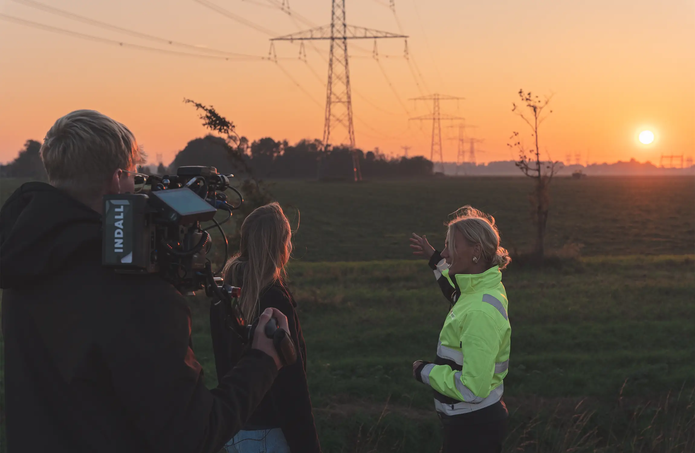 Indall's cameraman is recording footage for a corporate film
