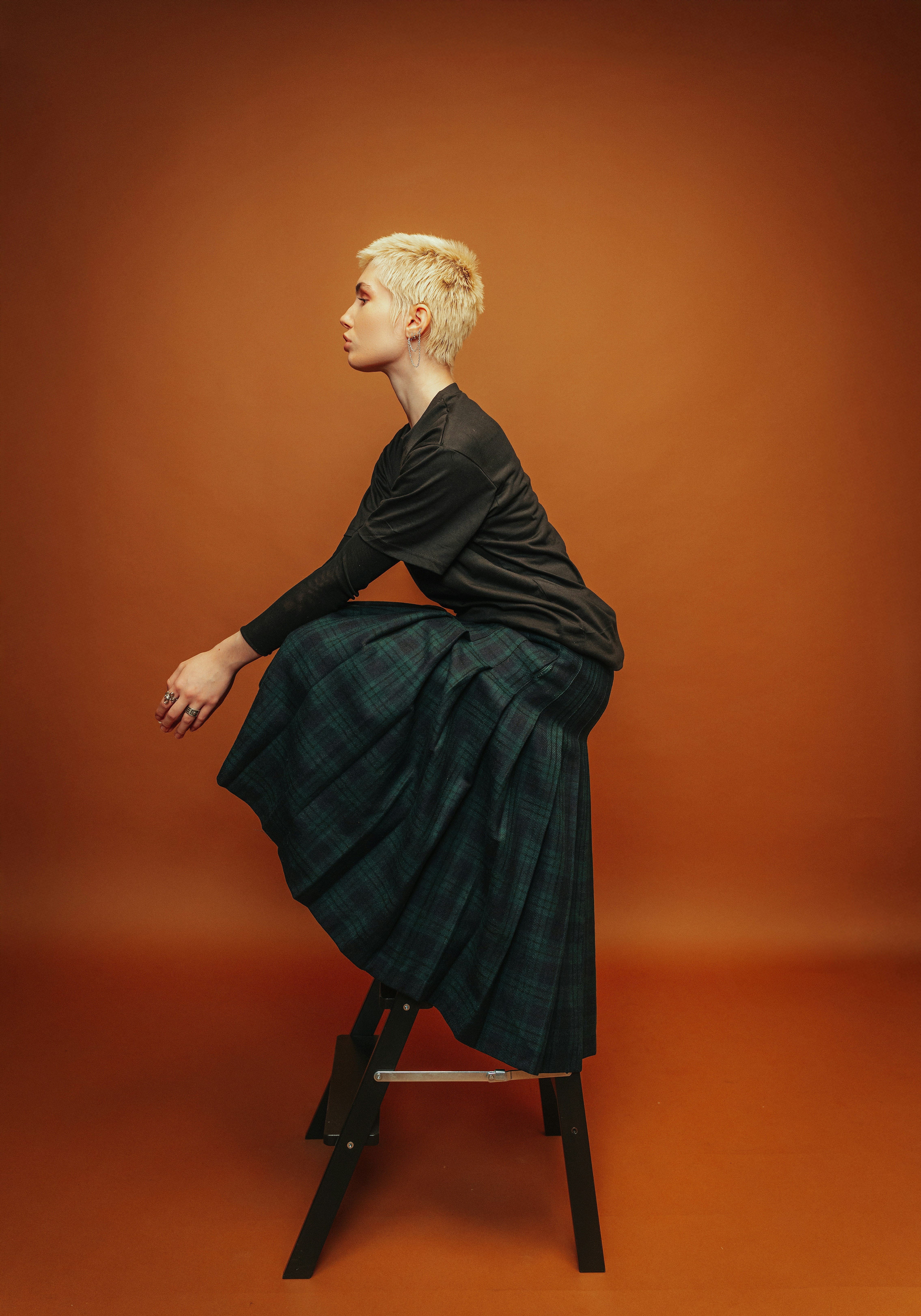 man in white crew neck shirt wearing black framed eyeglasses