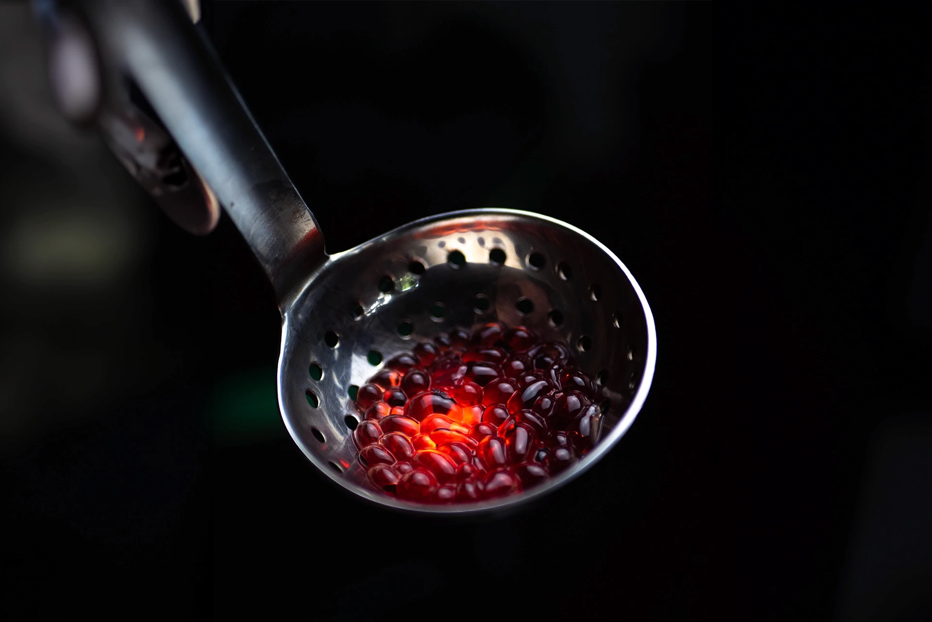 A man and a woman sitting at a bar