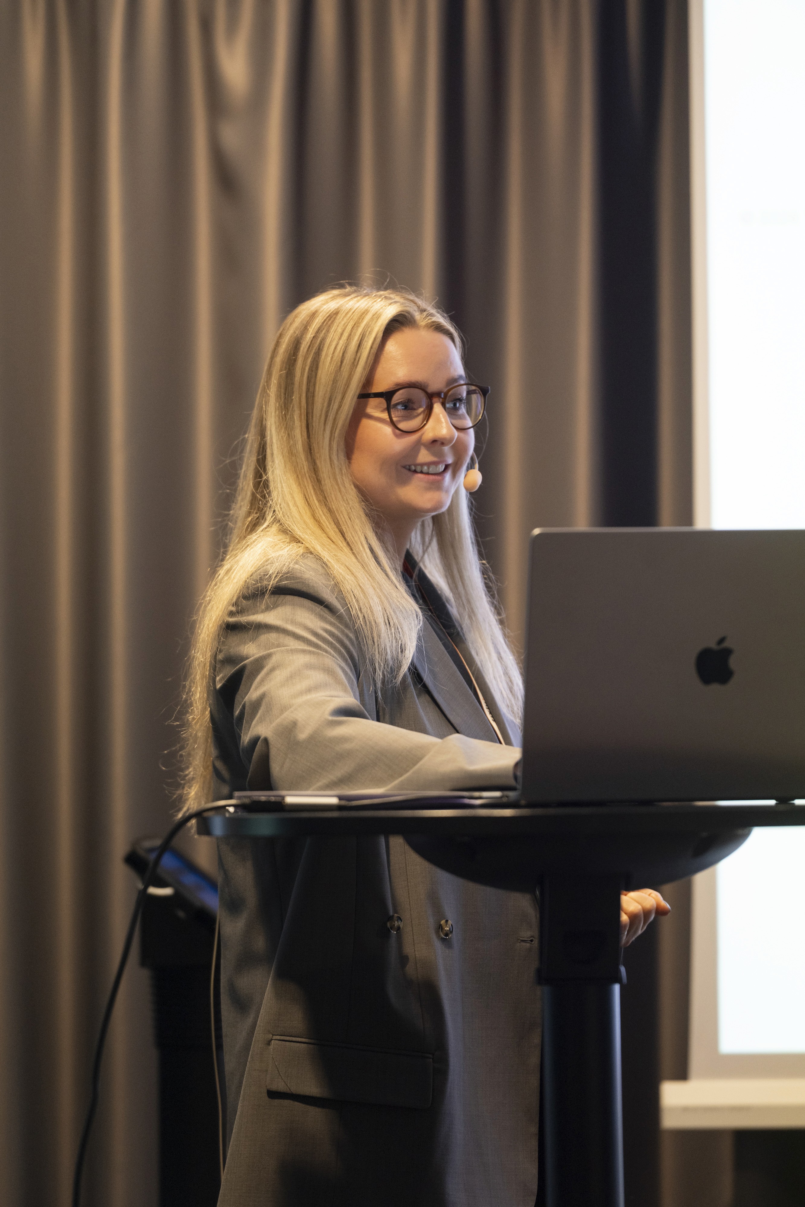 Sigrún Arna Sigurðardóttir giving her presentation on Tixly's development projects