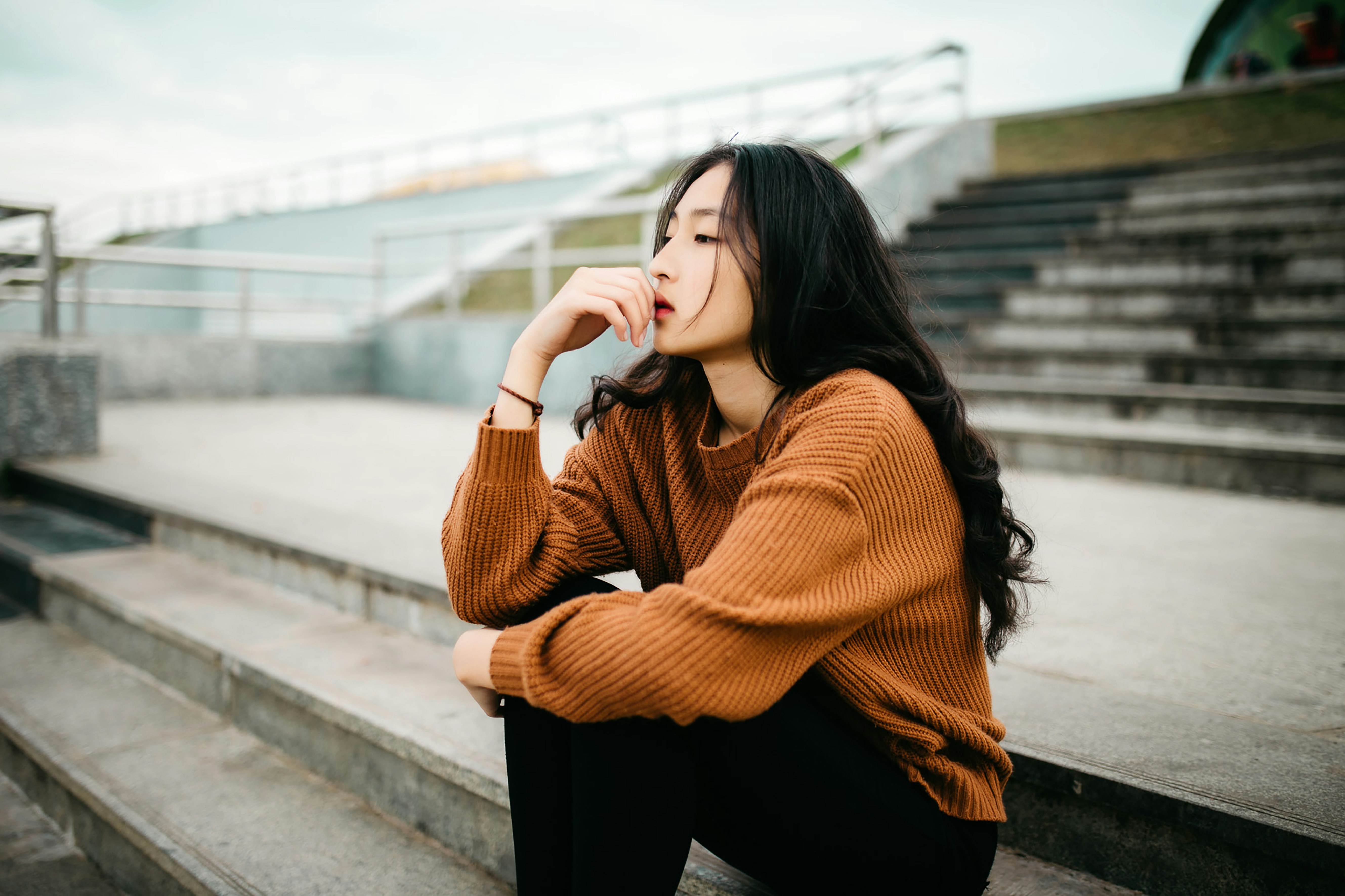 woman thinknig about 10-Step Skincare Routine