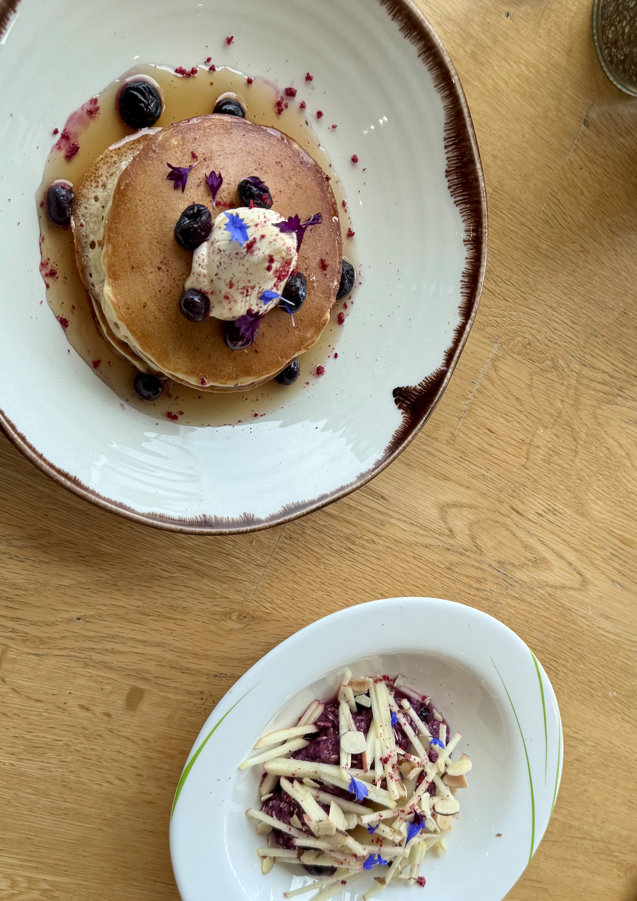 Pancakes along with a healthy blueberry bircher and 