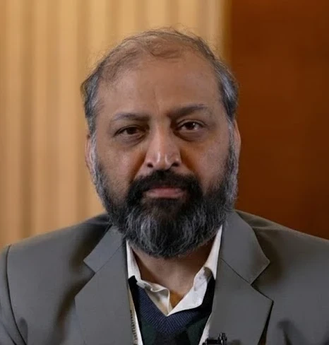 Couple hiking on a sunny trail