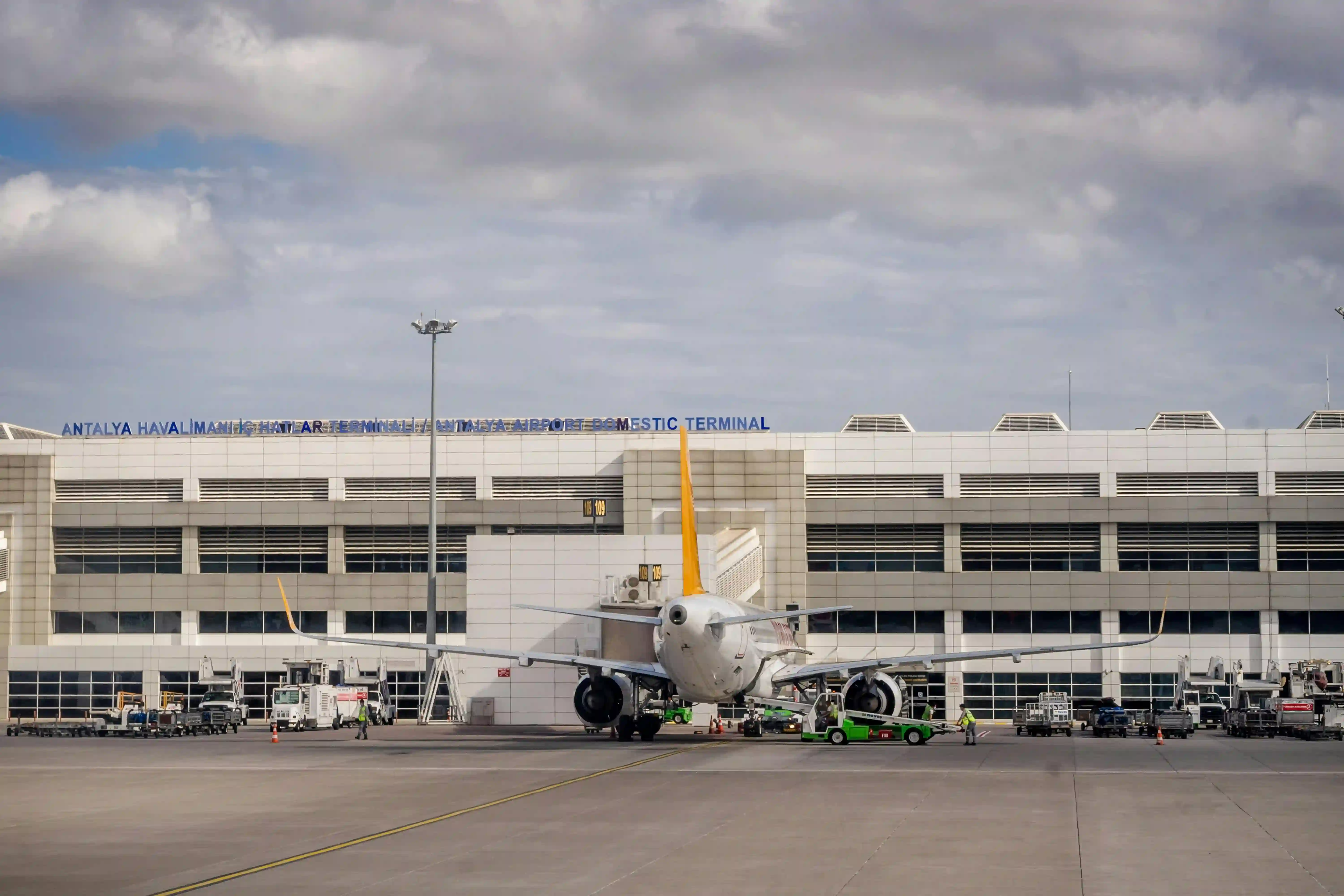 A plane on the runway at Antalya Airport