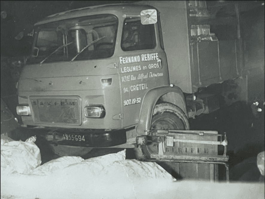 Group of men standing with Sufboard