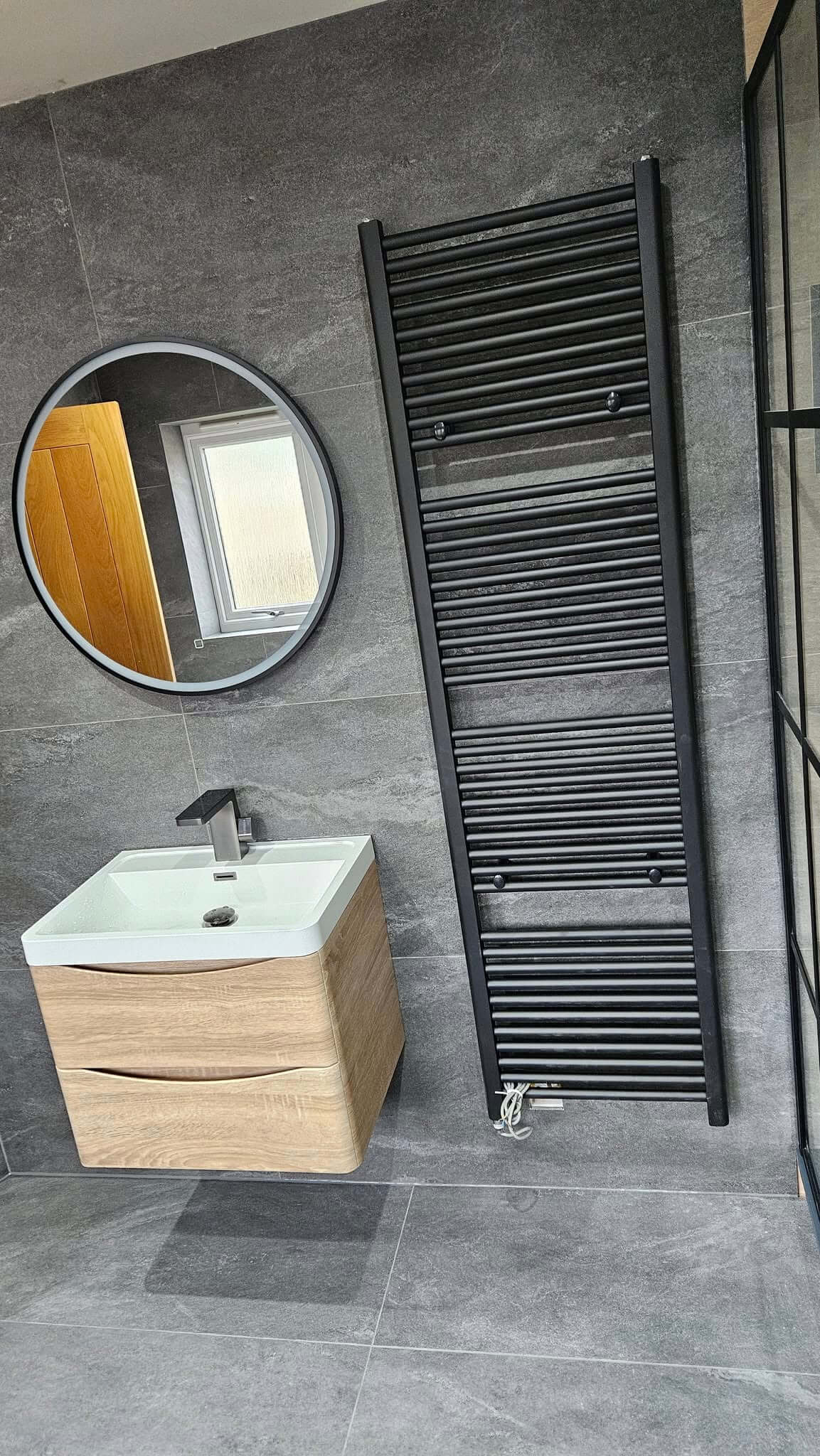 Walk-in shower in Hyde Park Leeds with glass panel
