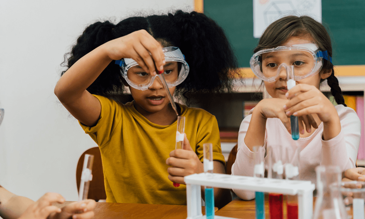 US high school students conducting STEM research under university mentor guidance in 2026