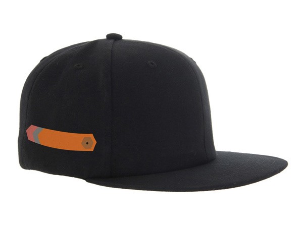 A black baseball cap with a flat brim and a small button on top. A horizontal orange band with gray and pink stripes is visible on the front of the cap. The cap is positioned against a white background.