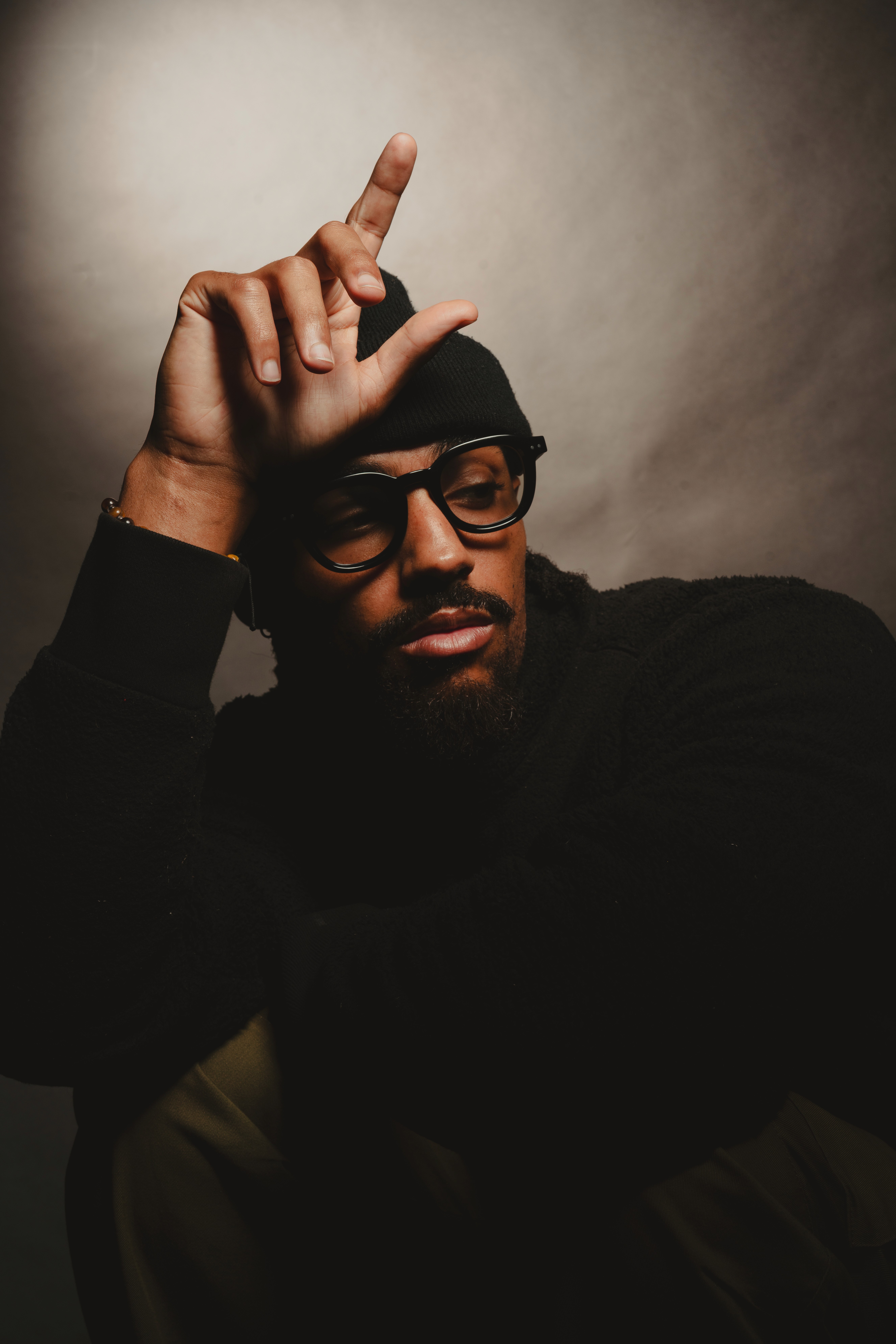 Photographer posing for editorial shoot