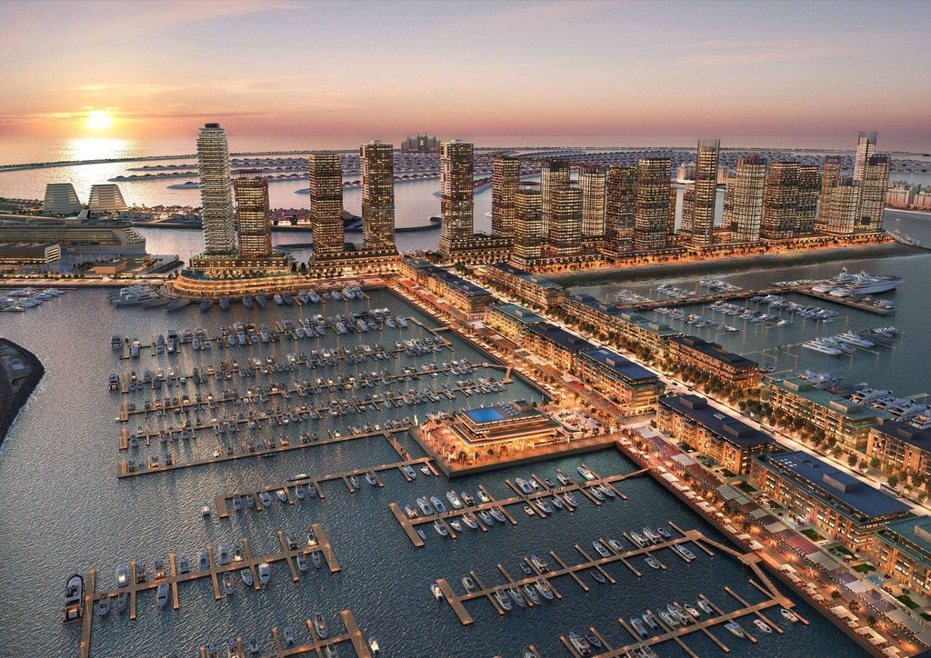 Emaar Beachfront Bay features modern architecture with stunning views of the beach and skyline, inviting relaxation and leisure.