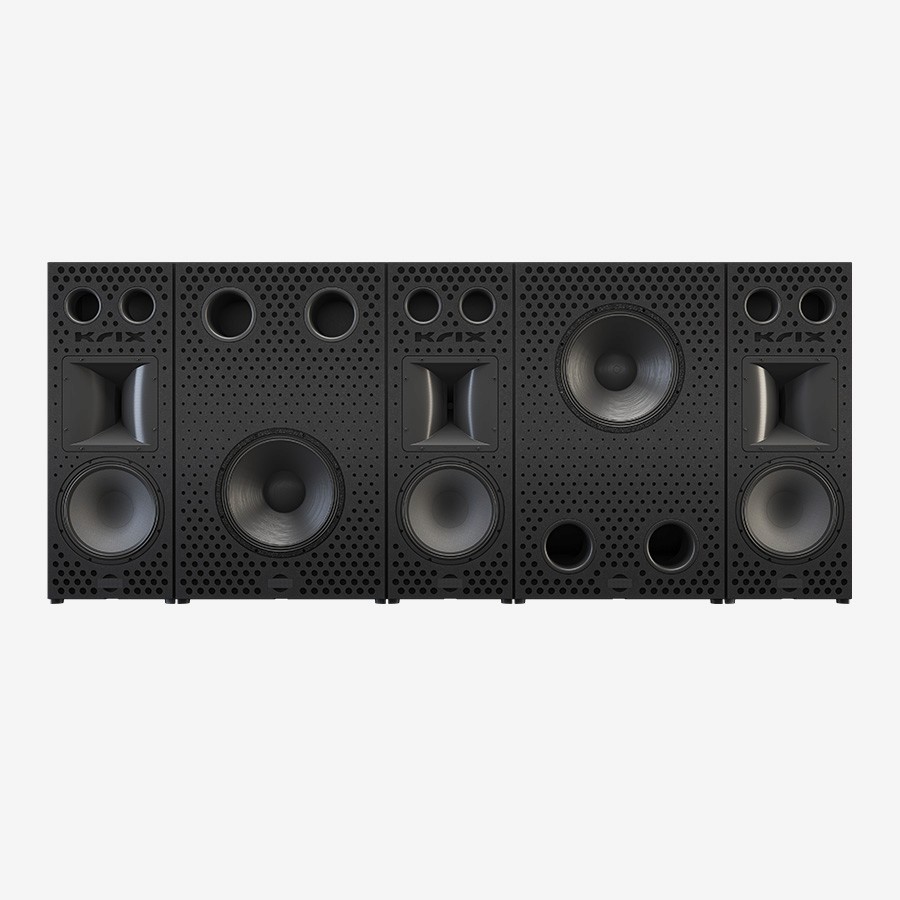 Wall of black speakers with perforated front panels.