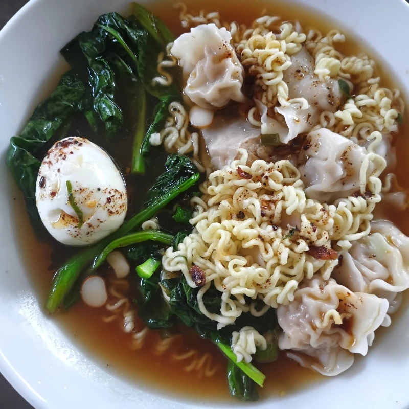 Ramen in  beef broth with pork and shrimp dumplings.