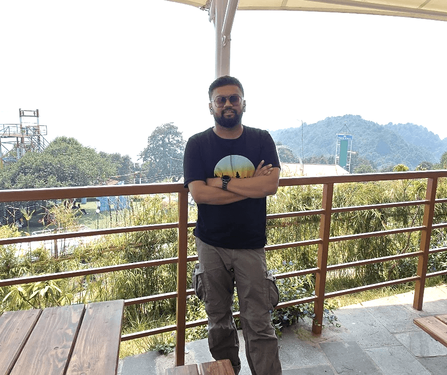 man standing in front of window
