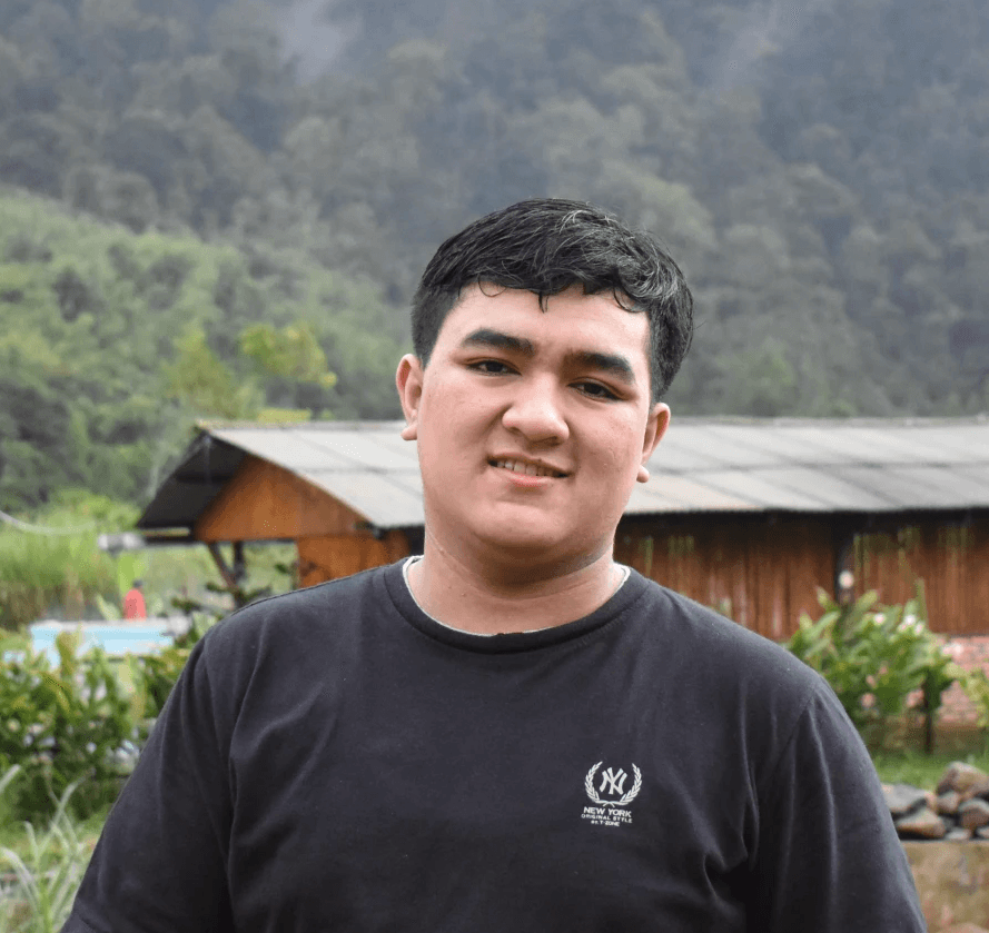 A portrait of a young man smiling