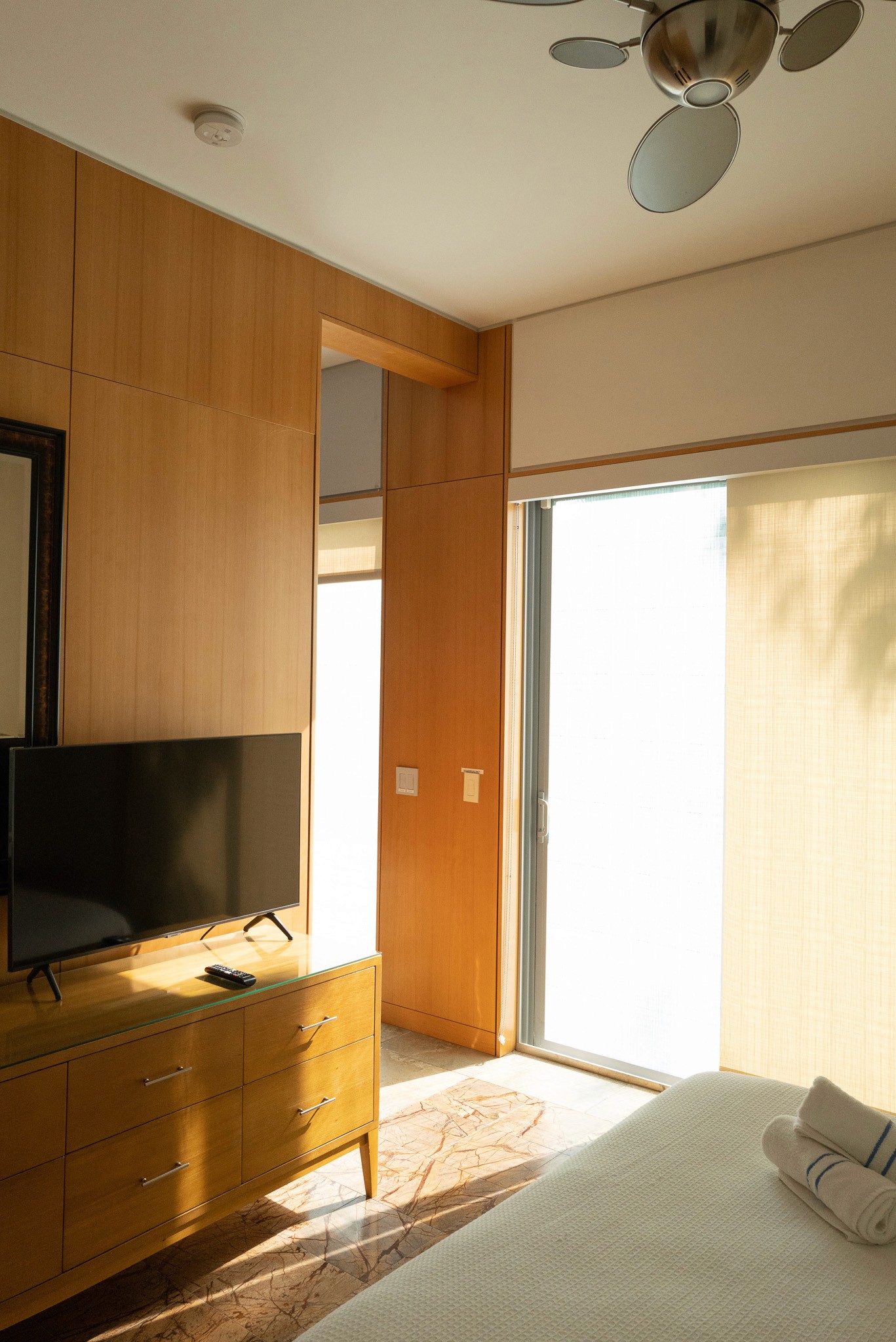 bedroom with minimalist decor, blending style and comfort in contemporary Key West lodging
