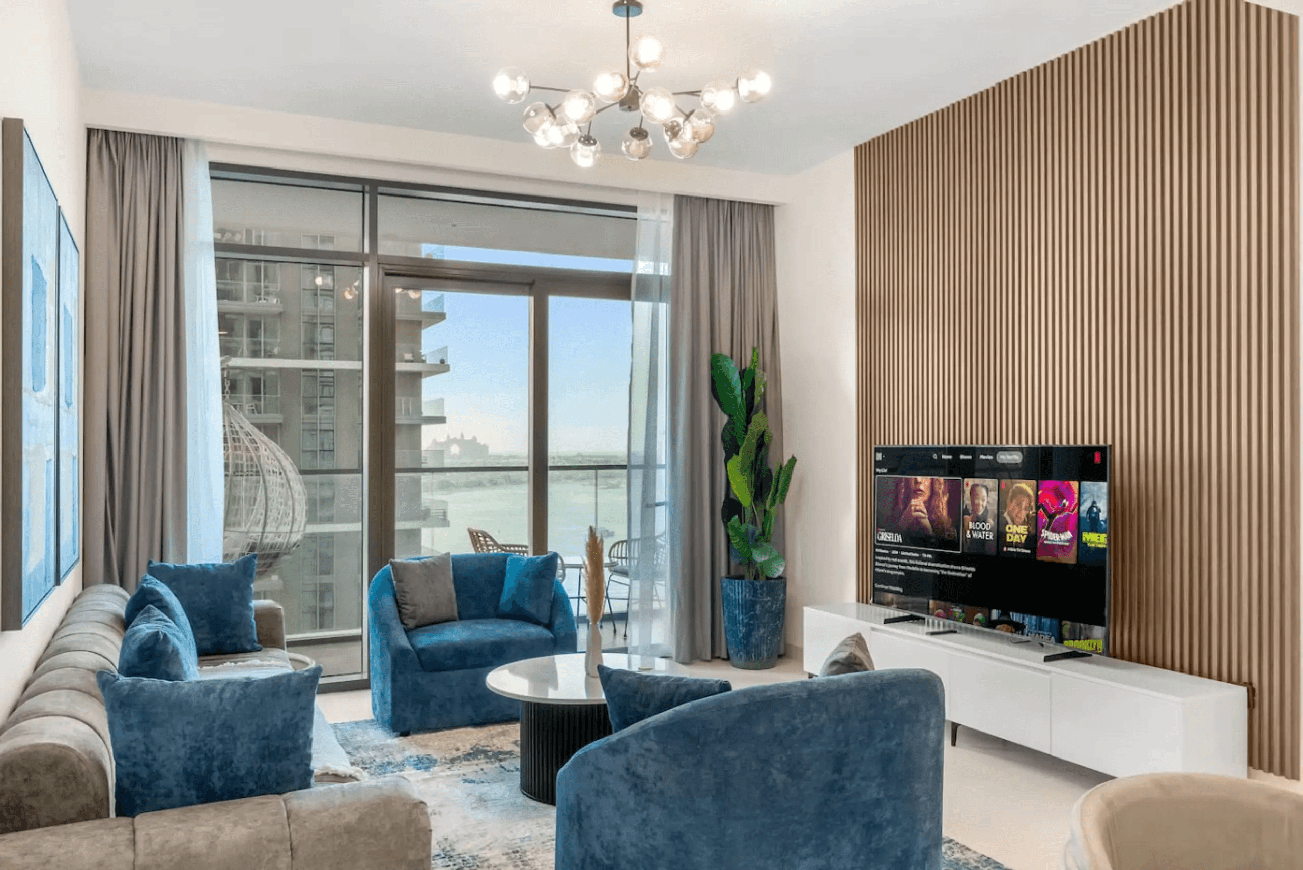 black laptop computer on bed