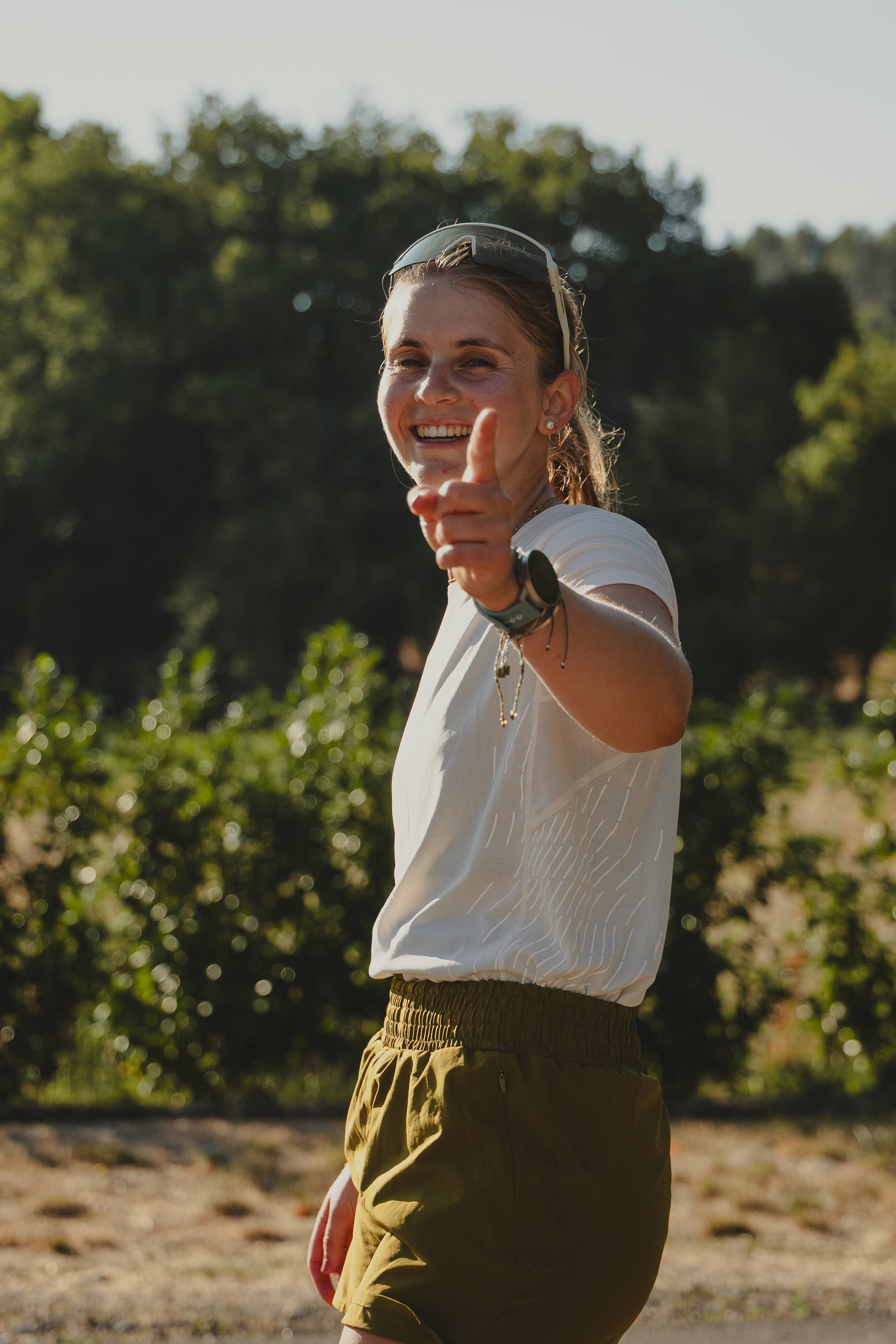 women ultra trail runner smiling