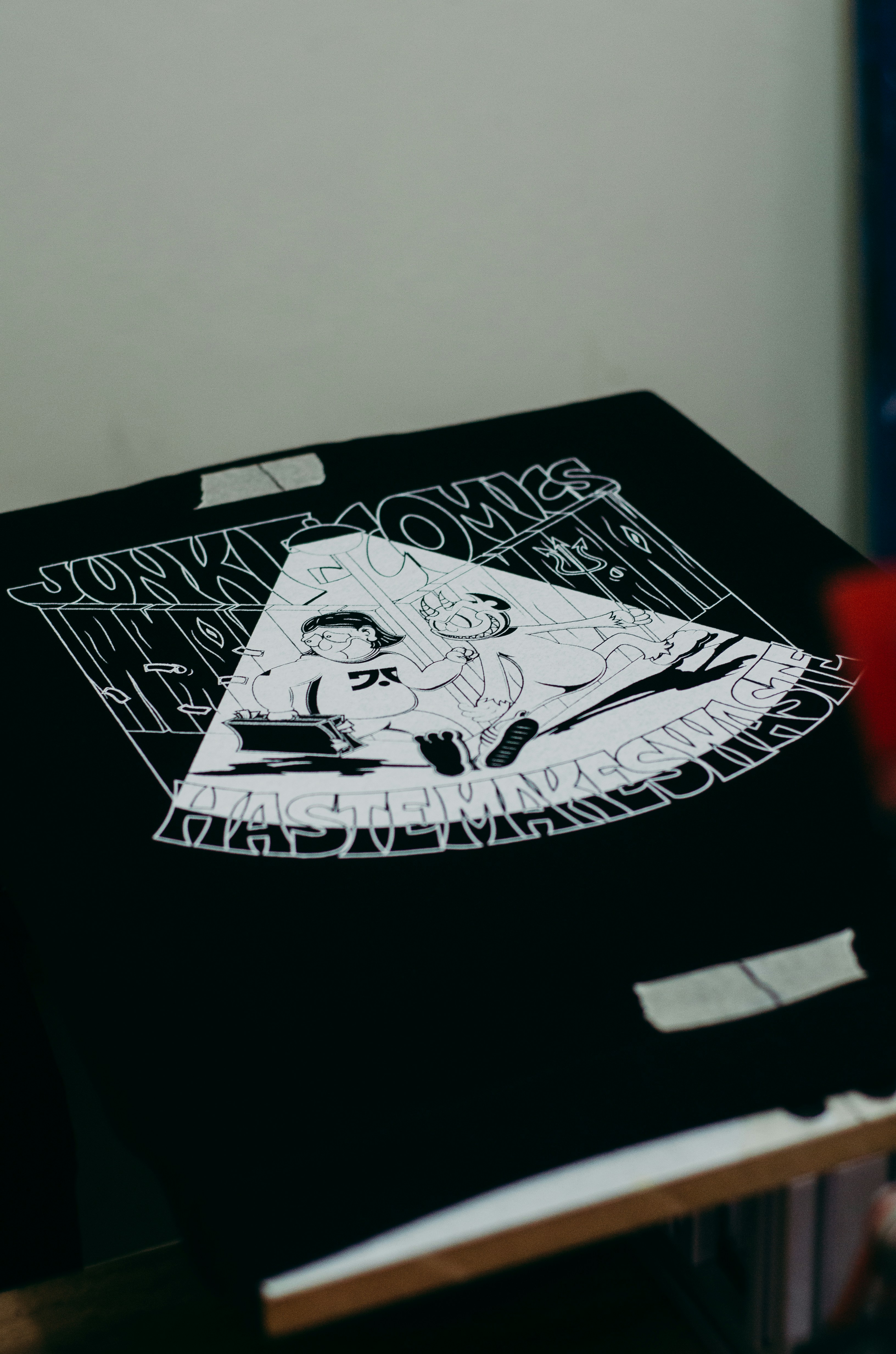 a drawing of a man with a hat on a table