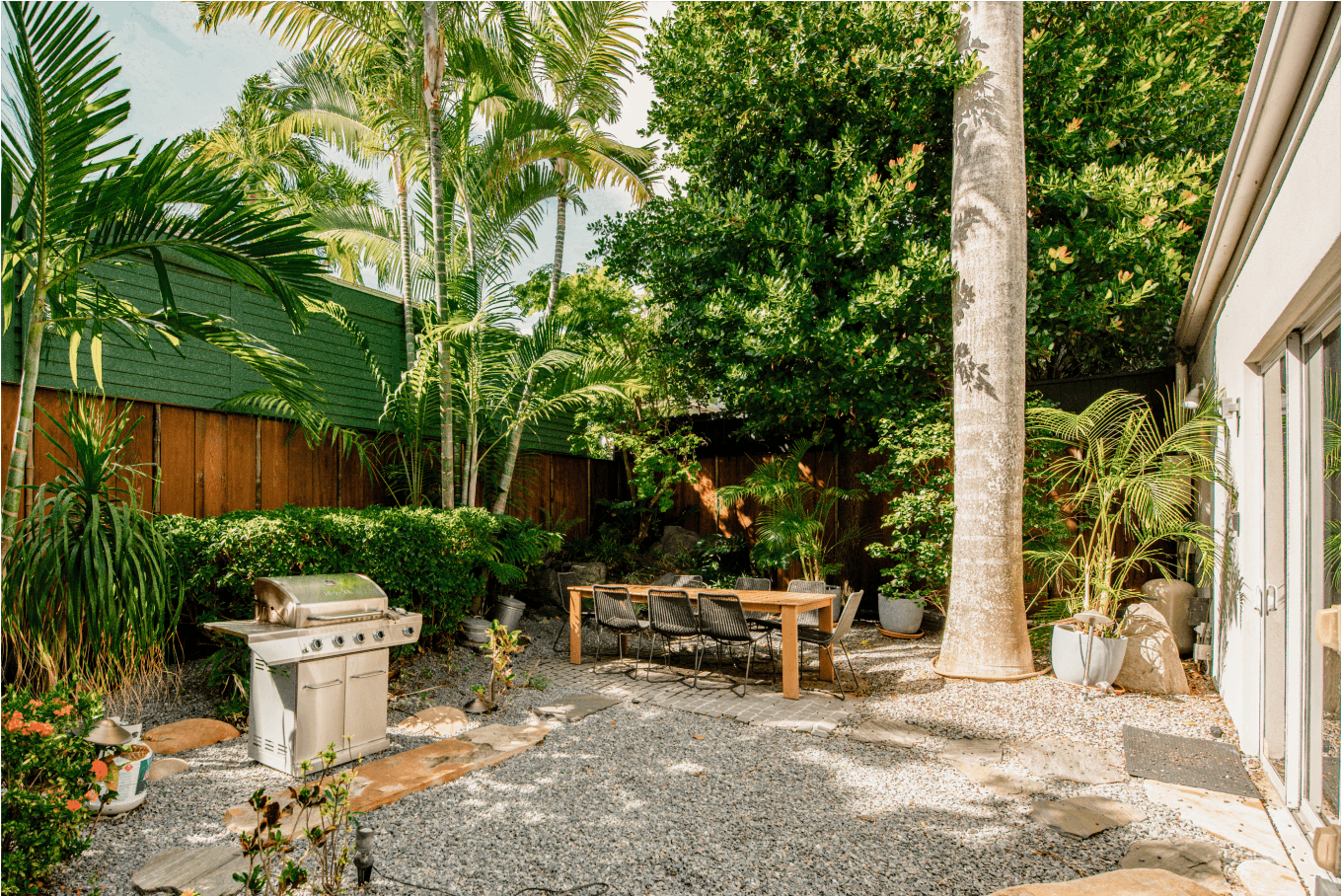 private garden area surrounded by lush greenery—an exclusive Key West sanctuary for relaxation